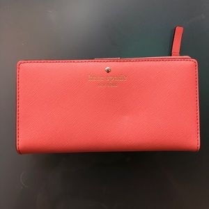 Kate spade wallet in orange. Great condition!